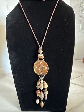 Tribal, Ethnic, Bohemian Style Necklace with Multi-Charm Dangles on Brown Cord